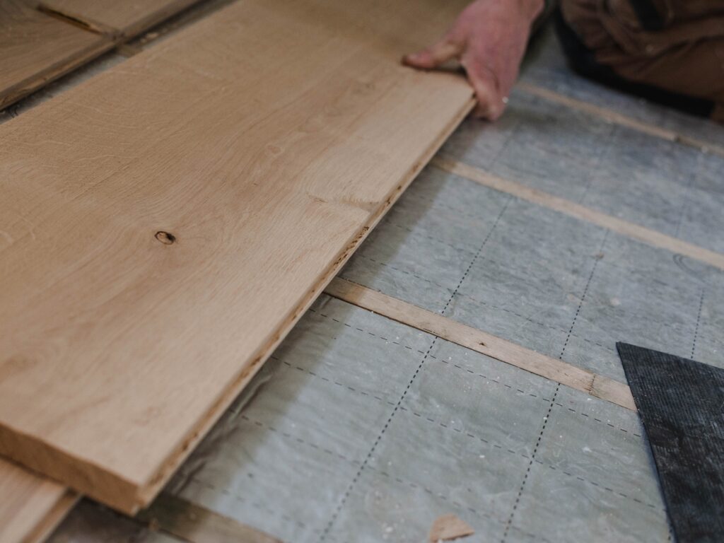 laying solid wood flooring